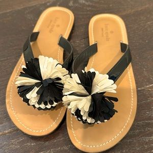 Kate Spade Irvina black patent flip flop sandal.